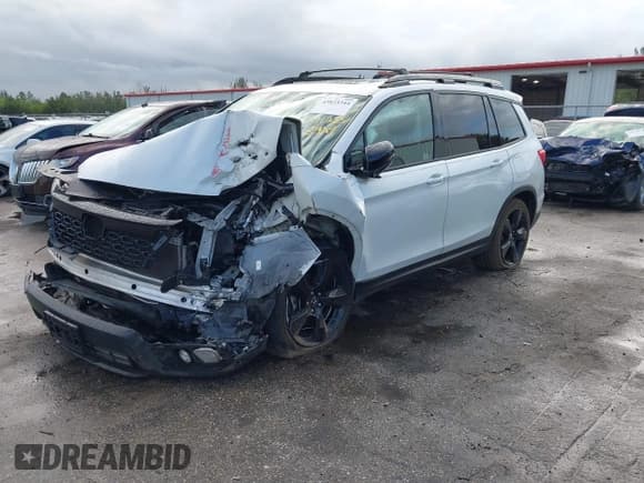 ✅ 2019 Honda Passport Elite • VIN: 5FNYF8H03KB023989 • Lot: 43823344. Listed on IAAI with Not provided. Free auction sales archive from the USA and detailed vehicle history report at DreamBid. Image 17.