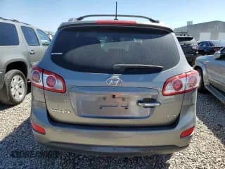 ✅ 2012 Hyundai Santa Fe Limited • VIN: 5XYZK4AG6CG099703 • Lot: 77861484. Listed on Copart with 243,905 mi. Free auction sales archive from the USA and detailed vehicle history report at DreamBid. Image 6.