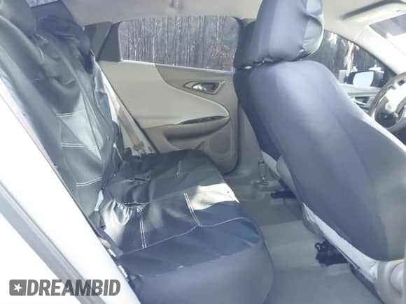 2018 Chevrolet Malibu LS z VIN 1G1ZC5ST8JF194027, wystawiony jako IAAI lot #41209623 z przebiegiem 112 940 mil mil oraz . Historia ofert i sprzedaży dostępna na DreamBid. Obrazek 8.