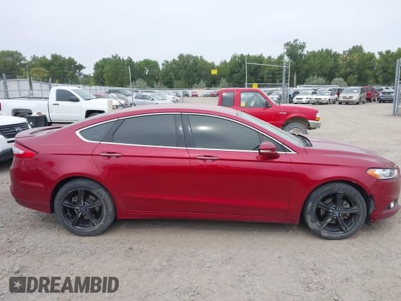 ✅ 2014 Ford Fusion Titanium • VIN: 3FA6P0D99ER178291 • Lot: 43069612. Wystawiony na IAAI z przebiegiem 177 865 mil. Bezpłatny archiwum sprzedaży aukcyjnych z USA i szczegółowy raport historii pojazdu na DreamBid. Zdjęcie 14.