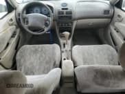 ✅ 1999 Toyota Corolla LE • VIN: 1NXBR12E6XZ148570 • Лот: 81554415. Опубликован ранее на Copart с пробегом 264 960 миль. Бесплатный доступ к архиву аукционных продаж из США и подробный отчёт об истории автомобиля на DreamBid. Изображение 8.