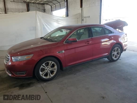 ✅ 2014 Ford Taurus SEL • VIN: 1FAHP2H80EG142079 • Лот: 70718465. Опубликован ранее на Copart с пробегом 90 065 миль. Бесплатный доступ к архиву аукционных продаж из США и подробный отчёт об истории автомобиля на DreamBid. Изображение 1.