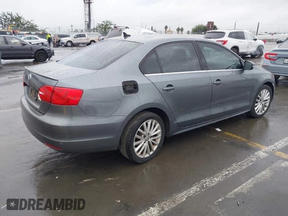 ✅ 2013 Volkswagen Jetta SEL • VIN: 3VWLP7AJ2DM440911 • Lot: 43678280. Listed on IAAI with 133,618 mi. Free auction sales archive from the USA and detailed vehicle history report at DreamBid. Image 4.