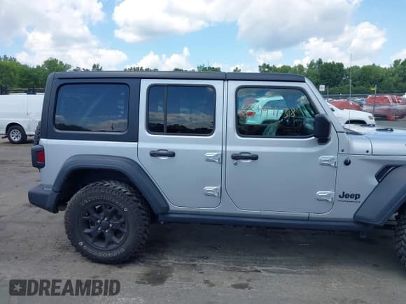 ✅ 2023 Jeep Wrangler Sport S • VIN: 1C4HJXDN2PW615882 • Lot: 42791138. Listed on IAAI with 21,993 mi. Free auction sales archive from the USA and detailed vehicle history report at DreamBid. Image 13.
