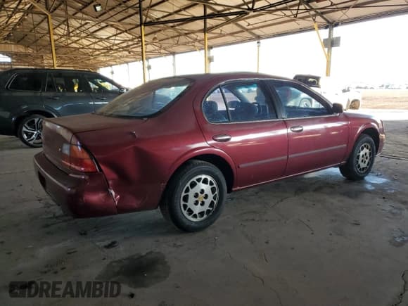 ✅ 1996 Nissan Maxima GXE • VIN: JN1CA21D4TT120977 • Lot: 81770864. Listed on Copart with 168,059 mi. Free auction sales archive from the USA and detailed vehicle history report at DreamBid. Image 3.
