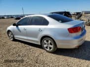 ✅ 2012 Volkswagen Jetta TDI • VIN: 3VWLL7AJ3CM334221 • Lot: 90687875. Listed on Copart with 160,686 mi. Free auction sales archive from the USA and detailed vehicle history report at DreamBid. Image 2.