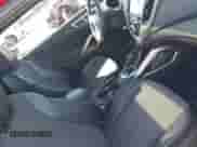 2016 Hyundai Veloster z VIN KMHTC6AD9GU282761, wystawiony jako IAAI lot #43624975 z przebiegiem 126 546 mil mil oraz . Historia ofert i sprzedaży dostępna na DreamBid. Obrazek 5.