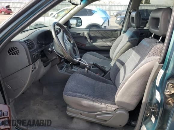 ✅ 1998 Honda Passport LX • VIN: 4S6CM58W2W4403473 • Lot: 66621474. Listed on Copart with 154,892 mi. Free auction sales archive from the USA and detailed vehicle history report at DreamBid. Image 7.