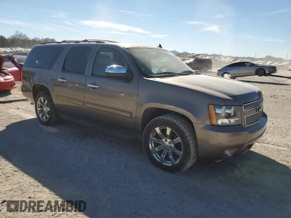 ✅ 2013 Chevrolet Suburban LT • VIN: 1GNSCJE05DR144117 • Lot: 80185134. Wystawiony na Copart z przebiegiem 242 877 mil. Bezpłatny archiwum sprzedaży aukcyjnych z USA i szczegółowy raport historii pojazdu na DreamBid. Zdjęcie 4.