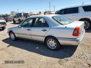 ✅ 1995 Mercedes-Benz C 2.8L • VIN: WDBHA28E7SF255142 • Лот: 68411704. Опубликован ранее на Copart с пробегом 334 000 миль. Бесплатный доступ к архиву аукционных продаж из США и подробный отчёт об истории автомобиля на DreamBid. Изображение 2.