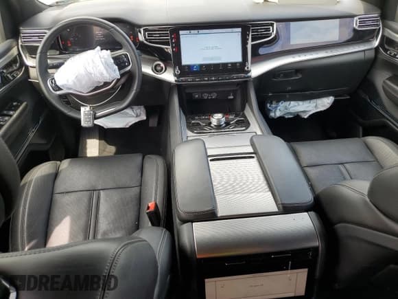 ✅ 2023 Jeep Grand Wagoneer • VIN: 1C4SJSEP2PS557840 • Лот: 69240965. Опубликован ранее на Copart с пробегом 37 285 миль. Бесплатный доступ к архиву аукционных продаж из США и подробный отчёт об истории автомобиля на DreamBid. Изображение 8.