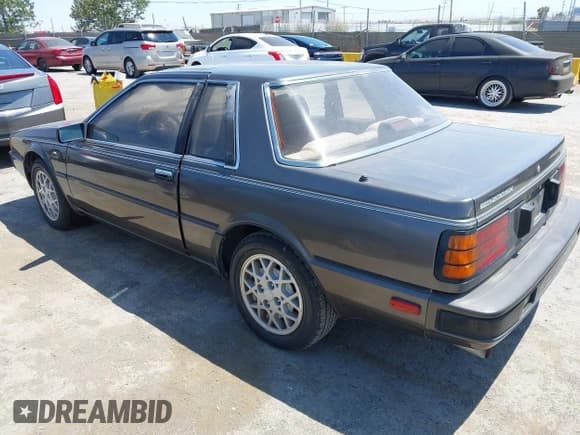 ✅ 1986 Nissan 200SX • VIN: JN1PS24S7GW112725 • Лот: 42533555. Опубликован ранее на IAAI с пробегом 74 240 миль. Бесплатный доступ к архиву аукционных продаж из США и подробный отчёт об истории автомобиля на DreamBid. Изображение 3.