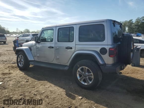 ✅ 2019 Jeep Wrangler Unlimited Sahara • VIN: 1C4HJXEN3KW550029 • Лот: 81956695. Опубликован ранее на Copart с пробегом 61 851 миль. Бесплатный доступ к архиву аукционных продаж из США и подробный отчёт об истории автомобиля на DreamBid. Изображение 2.