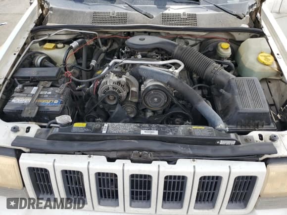 ✅ 1996 Jeep Grand Cherokee Limited • VIN: 1J4EZ78YXTC122036 • Lot: 70358055. Listed on Copart with 185,601 mi. Free auction sales archive from the USA and detailed vehicle history report at DreamBid. Image 12.