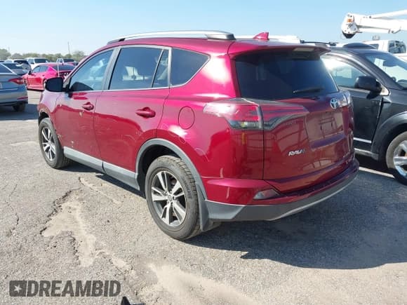 ✅ 2018 Toyota RAV4 XLE • VIN: 2T3WFREV8JW493988 • Lot: 43527256. Listed on IAAI with 104,333 mi. Free auction sales archive from the USA and detailed vehicle history report at DreamBid. Image 3.