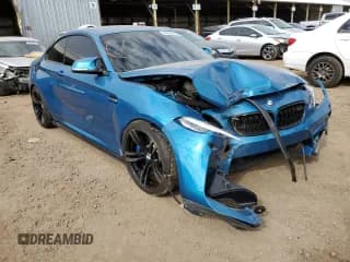 ✅ 2018 BMW M2 • VIN: WBS1J5C57JVD36167 • Lot: 64653092. Wystawiony na Copart z przebiegiem 44 038 mil. Bezpłatny archiwum sprzedaży aukcyjnych z USA i szczegółowy raport historii pojazdu na DreamBid. Zdjęcie 1.