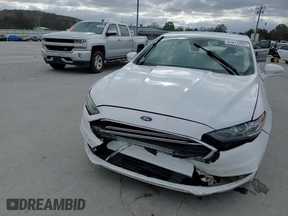 ✅ 2017 Ford Fusion Hybrid SE • VIN: 3FA6P0LU8HR172198 • Lot: 91813455. Wystawiony na Copart z przebiegiem 180 468 mil. Bezpłatny archiwum sprzedaży aukcyjnych z USA i szczegółowy raport historii pojazdu na DreamBid. Zdjęcie 13.