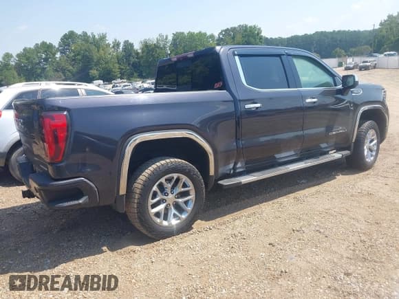 ✅ 2022 GMC Sierra 1500 Denali • VIN: 3GTUUGEL4NG666024 • Лот: 43181277. Опубликован ранее на IAAI с пробегом 69 819 миль. Бесплатный доступ к архиву аукционных продаж из США и подробный отчёт об истории автомобиля на DreamBid. Изображение 4.