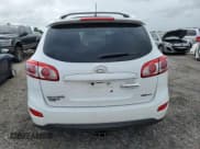 ✅ 2012 Hyundai Santa Fe Limited • VIN: 5XYZKDAG1CG143185 • Lot: 74531934. Listed on Copart with 186,312 mi. Free auction sales archive from the USA and detailed vehicle history report at DreamBid. Image 6.