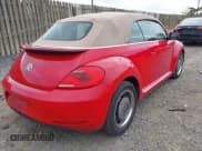 ✅ 2013 Volkswagen Beetle 2.5L • VIN: 3VW5P7AT0DM800722 • Lot: 42222471. Listed on IAAI with 99,247 mi. Free auction sales archive from the USA and detailed vehicle history report at DreamBid. Image 4.