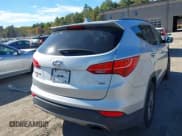 ✅ 2014 Hyundai Santa Fe • VIN: 5XYZUDLB5EG127411 • Lot: 43442706. Listed on IAAI with 68,022 mi. Free auction sales archive from the USA and detailed vehicle history report at DreamBid. Image 17.