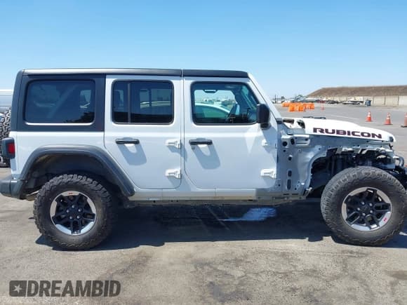 ✅ 2022 Jeep Wrangler Unlimited Rubicon • VIN: 1C4HJXFN3NW175424 • Lot: 42616441. Listed on IAAI with 33,534 mi. Free auction sales archive from the USA and detailed vehicle history report at DreamBid. Image 14.