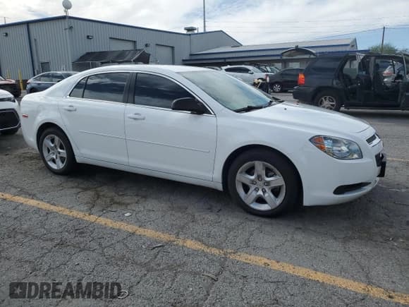 ✅ 2012 Chevrolet Malibu 1LS • VIN: 1G1ZB5E01CF241860 • Lot: 86106485. Listed on Copart with 81,758 mi. Free auction sales archive from the USA and detailed vehicle history report at DreamBid. Image 4.