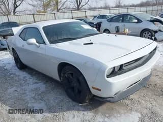 ✅ 2012 Dodge Challenger SXT • VIN: 2C3CDYAG9CH125191 • Lot: 41412556. Wystawiony na IAAI z przebiegiem 123 524 mil. Bezpłatny archiwum sprzedaży aukcyjnych z USA i szczegółowy raport historii pojazdu na DreamBid. Zdjęcie 1.
