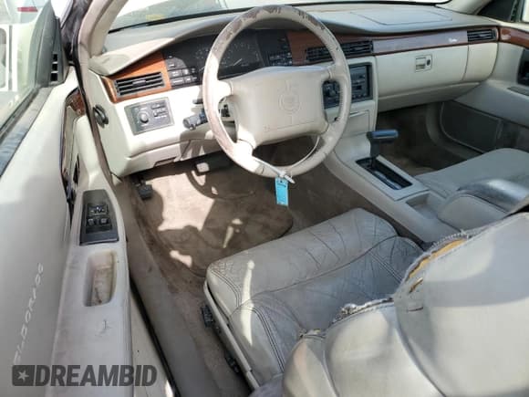 ✅ 1995 Cadillac Eldorado • VIN: 1G6EL12Y2SU605237 • Lot: 90877855. Listed on Copart with 102,761 mi. Free auction sales archive from the USA and detailed vehicle history report at DreamBid. Image 8.