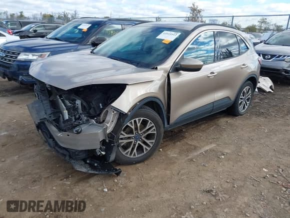 ✅ 2021 Ford Escape SEL • VIN: 1FMCU0H60MUA56556 • Lot: 43515512. Listed on IAAI with 85,795 mi. Free auction sales archive from the USA and detailed vehicle history report at DreamBid. Image 2.