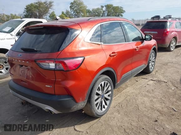 ✅ 2020 Ford Escape Titanium • VIN: 1FMCU9J97LUB10880 • Lot: 43414889. Listed on IAAI with 56,415 mi. Free auction sales archive from the USA and detailed vehicle history report at DreamBid. Image 4.