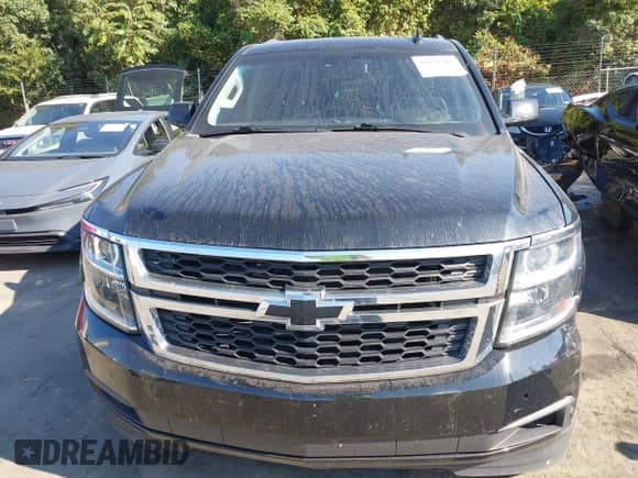 2018 Chevrolet Tahoe LT z VIN 1GNSKBKC8JR128657, wystawiony jako IAAI lot #43151589 z przebiegiem 157 909 mil mil oraz . Historia ofert i sprzedaży dostępna na DreamBid. Obrazek 12.