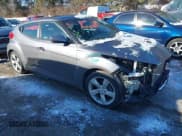 ✅ 2014 Hyundai Veloster • VIN: KMHTC6AD6EU204015 • Lot: 41318917. Wystawiony na IAAI z przebiegiem 77 355 mil. Bezpłatny archiwum sprzedaży aukcyjnych z USA i szczegółowy raport historii pojazdu na DreamBid. Zdjęcie 1.