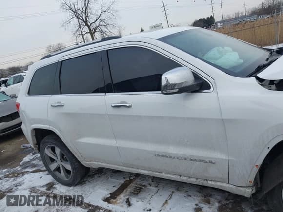 ✅ 2015 Jeep Grand Cherokee Overland • VIN: 1C4RJFCG7FC754178 • Lot: 41554947. Listed on IAAI with 164,413 mi. Free auction sales archive from the USA and detailed vehicle history report at DreamBid. Image 13.
