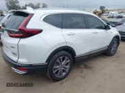 ✅ 2022 Honda CR-V Touring • VIN: 5J6RT6H95NL043897 • Lot: 43316993. Listed on IAAI with 154,584 mi. Free auction sales archive from the USA and detailed vehicle history report at DreamBid. Image 4.