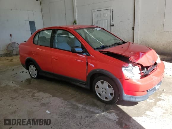 ✅ 2001 Toyota ECHO • VIN: JTDBT123110143229 • Lot: 84920065. Listed on Copart with 94,909 mi. Free auction sales archive from the USA and detailed vehicle history report at DreamBid. Image 4.