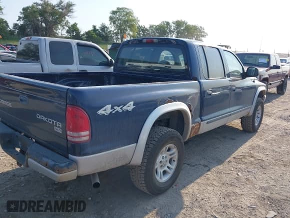 ✅ 2004 Dodge Dakota SLT • VIN: 1D7HG48N14S610012 • Lot: 39853794. Wystawiony na IAAI z przebiegiem 158 998 mil. Bezpłatny archiwum sprzedaży aukcyjnych z USA i szczegółowy raport historii pojazdu na DreamBid. Zdjęcie 4.