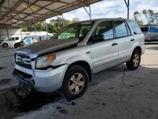2006 Honda Pilot LX with VIN 5FNYF18116B012124, listed as a Copart auction lot 82311145 with 159,515 mi miles and Salvage title. Bid and sale history available at DreamBid. Image 1.