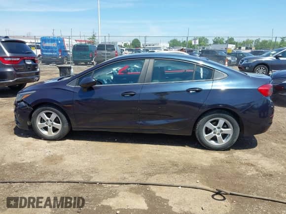 2016 Chevrolet Cruze LT with VIN 1G1BE5SM5G7269564, listed as a IAAI auction lot 42647283 with 149,326 mi miles and . Bid and sale history available at DreamBid. Image 14.