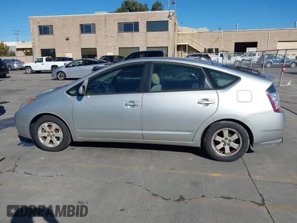 ✅ 2005 Toyota Prius • VIN: JTDKB20U353036014 • Lot: 43736103. Listed on IAAI with 122,145 mi. Free auction sales archive from the USA and detailed vehicle history report at DreamBid. Image 14.
