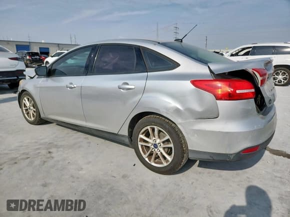 ✅ 2016 Ford Focus SE • VIN: 1FADP3F29GL202860 • Лот: 93662105. Опубликован ранее на Copart с пробегом 127 641 миль. Бесплатный доступ к архиву аукционных продаж из США и подробный отчёт об истории автомобиля на DreamBid. Изображение 2.