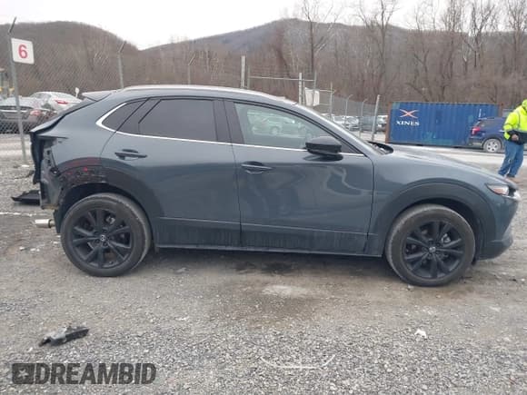 ✅ 2023 Mazda CX-30 S Carbon Edition • VIN: 3MVDMBCM8PM584296 • Lot: 41390814. Listed on IAAI with 19,959 mi. Free auction sales archive from the USA and detailed vehicle history report at DreamBid. Image 13.