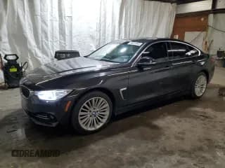✅ 2015 BMW 4 Series 428i xDrive • VIN: WBA4A7C59FD415525 • Lot: 69001045. Listed on Copart with 99,432 mi. Free auction sales archive from the USA and detailed vehicle history report at DreamBid. Image 1.