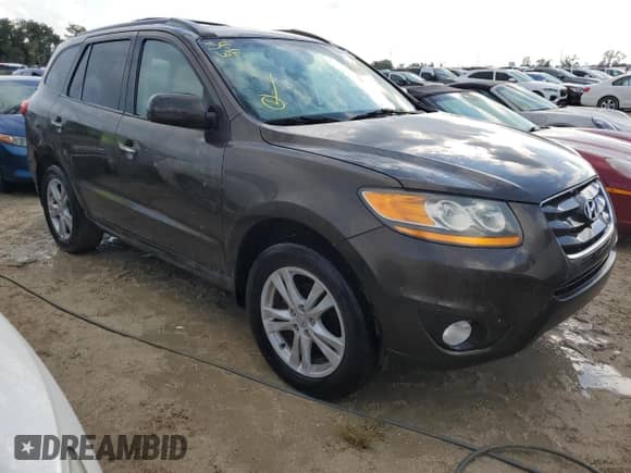 2011 Hyundai Santa Fe Limited с VIN 5XYZK4AG5BG060566, выставлен на аукционе Copart как лот 73656314 с пробегом Не указан миль и На запчасти • Non repairable. История ставок и продаж доступна на DreamBid. Изображение 4.