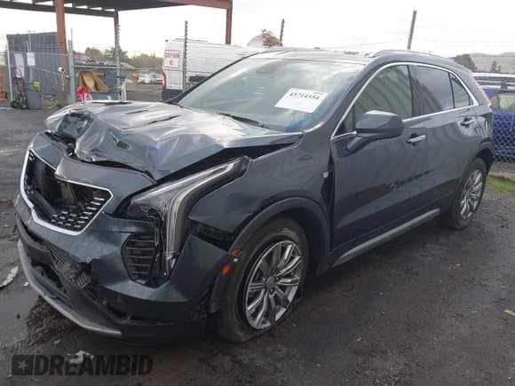 ✅ 2020 Cadillac XT4 FWD Premium Luxury • VIN: 1GYFZCR40LF123221 • Lot: 43714554. Wystawiony na IAAI z przebiegiem 32 164 mil. Bezpłatny archiwum sprzedaży aukcyjnych z USA i szczegółowy raport historii pojazdu na DreamBid. Zdjęcie 17.