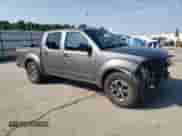 2017 Nissan Frontier Desert Runner with VIN 1N6DD0ER2HN728234, listed as a Copart auction lot 69136105 with 192,501 mi miles and Salvage title. Bid and sale history available at DreamBid. Image 4.