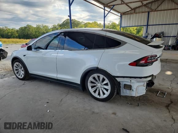 ✅ 2020 Tesla Model X Long Range • VIN: 5YJXCDE26LF303233 • Lot: 70808465. Listed on Copart with 65,522 mi. Free auction sales archive from the USA and detailed vehicle history report at DreamBid. Image 2.
