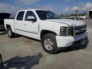 2007 Chevrolet Silverado 1500 1LT with VIN 2GCEC13J271552525, listed as a Copart auction lot 82695515 with 217,147 mi miles and Salvage title. Bid and sale history available at DreamBid. Image 4.