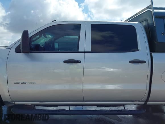 ✅ 2015 Chevrolet Silverado 2500HD LT • VIN: 1GC1KVEG7FF161176 • Lot: 42684231. Listed on IAAI with 242,456 mi. Free auction sales archive from the USA and detailed vehicle history report at DreamBid. Image 14.