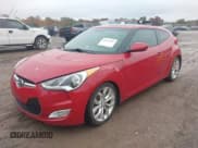 ✅ 2012 Hyundai Veloster w/Red Int • VIN: KMHTC6AD5CU066240 • Lot: 43544107. Listed on IAAI with 196,722 mi. Free auction sales archive from the USA and detailed vehicle history report at DreamBid. Image 2.